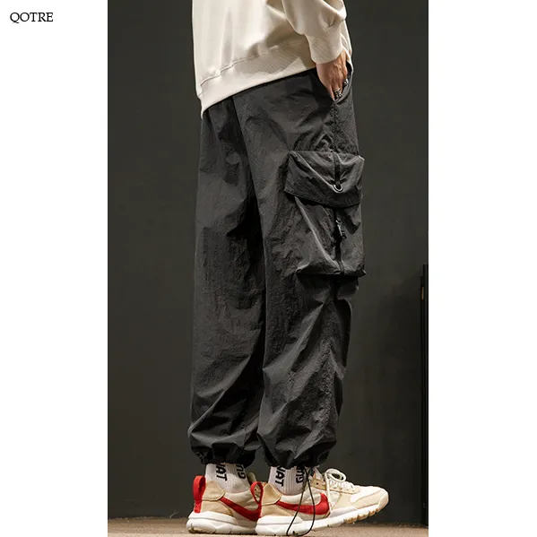 Elasticity Solid Color Tapered Versatile Bellows Pocket Loose Fit Cargo Pants