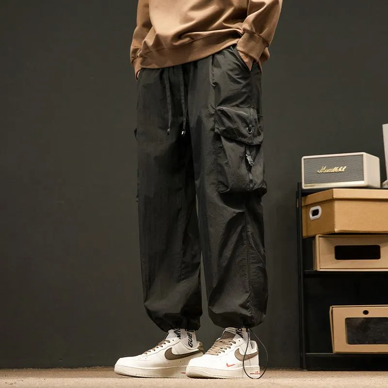 Elasticity Solid Color Tapered Versatile Bellows Pocket Loose Fit Cargo Pants