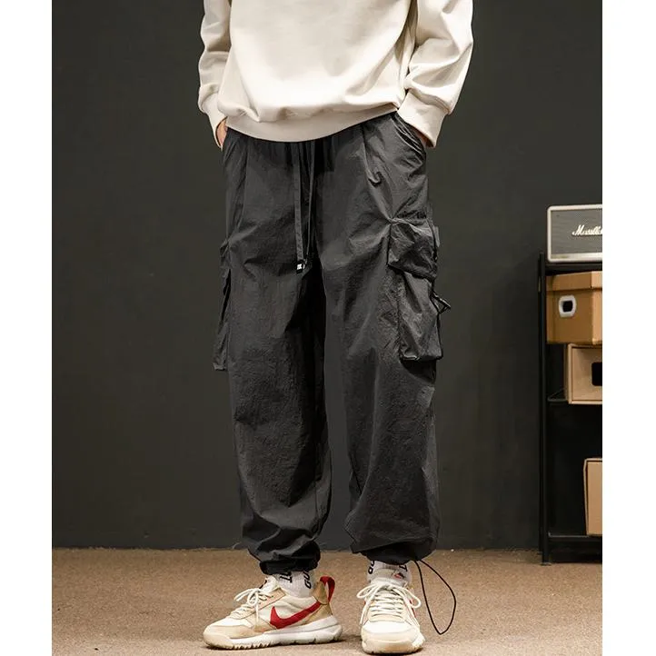 Elasticity Solid Color Tapered Versatile Bellows Pocket Loose Fit Cargo Pants