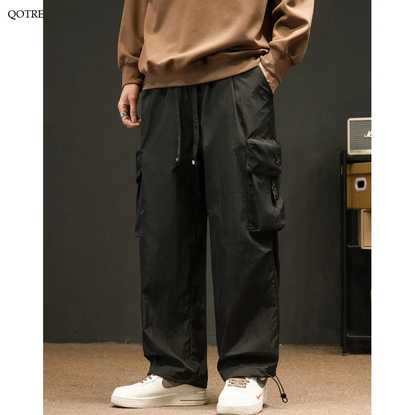 Elasticity Solid Color Tapered Versatile Bellows Pocket Loose Fit Cargo Pants