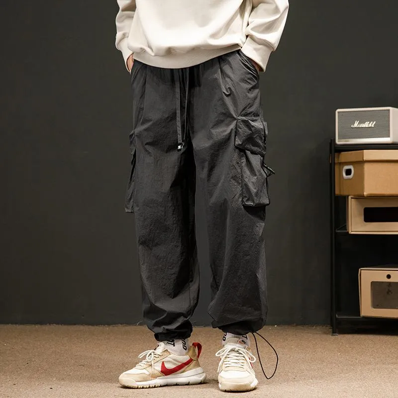 Elasticity Solid Color Tapered Versatile Bellows Pocket Loose Fit Cargo Pants