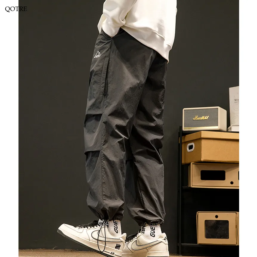 Loose Fit Drawstring Hem Elasticity Tapered Cargo Pants